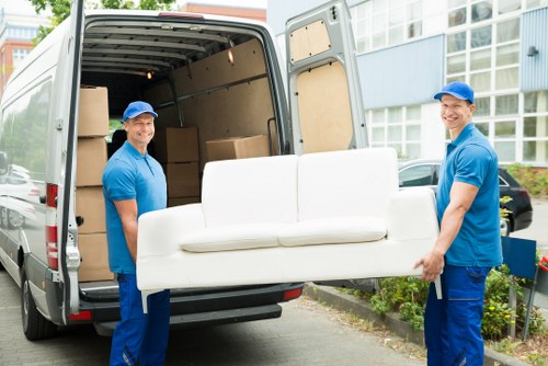 Man with van service loading items for transport
