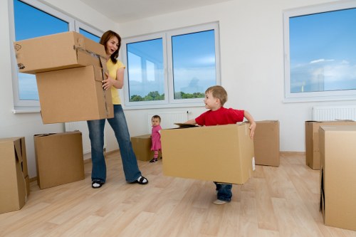 Removal team managing a flat move in a North London property