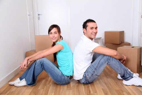 Office furniture and equipment being prepared for a commercial move